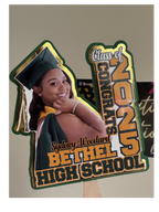 Graduation-themed cutout with a photo of a graduate and text celebrating Bethel High School's Class of 2025.